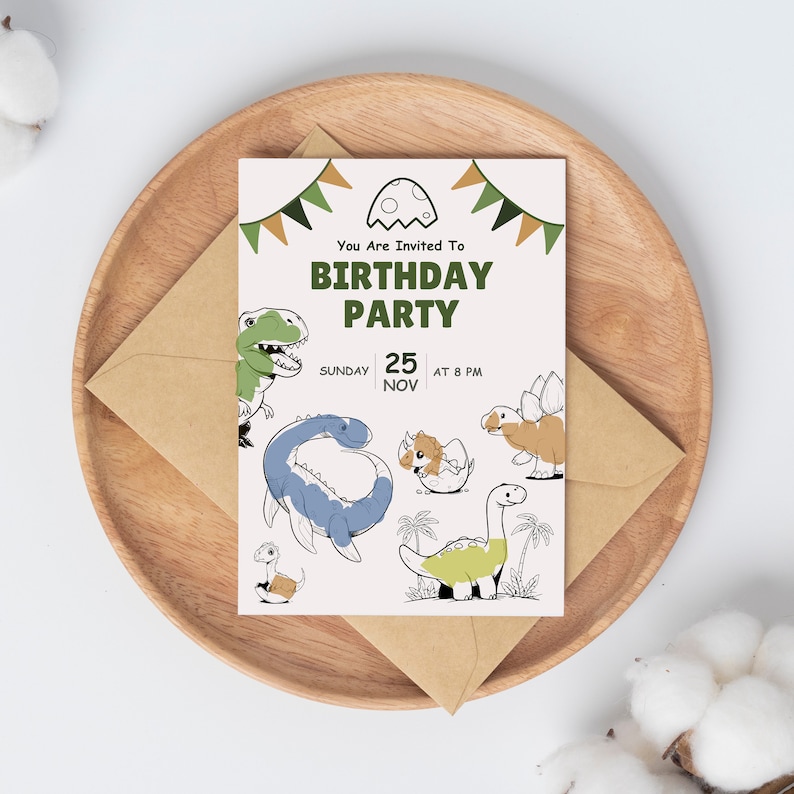 May include: A white card with green and brown dinosaur illustrations and the text "You Are Invited To Birthday Party Sunday 25 Nov At 8 PM".