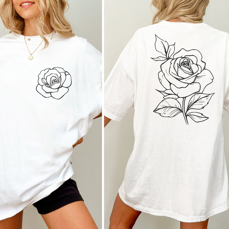 May include: White oversized t-shirt with a black line drawing of a rose on the front and a larger black line drawing of a rose on the back.