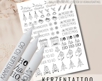 May include: White candles with "HO HO HO" and "KAMINFEUER TO GO" printed on them, alongside a sheet of Christmas-themed designs. The sheet includes text and illustrations of Christmas trees, gifts, and sleighs. The words "Merry Christmas" are also visible.
