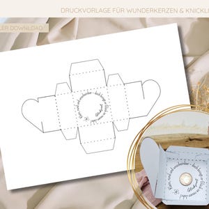 Kreative Geschenkverpackung mit Herzverschluss, geeignet für einen Cent als Glücksbringer, ideal für kleine Neujahrsaufmerksamkeiten.