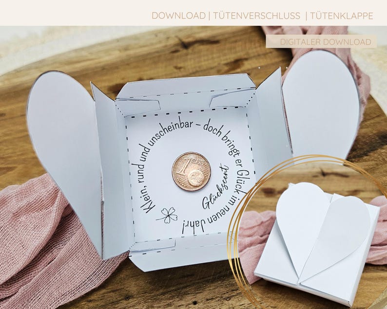 DIY-Box mit besonderem Herzverschluss, ideal zum Verschenken eines Cents als Glückssymbol für Silvester und Neujahr.