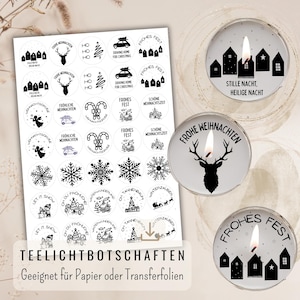 May include: A collection of black and white Christmas-themed stickers featuring festive designs like reindeer and houses. The image also displays three lit tea light candles with holiday-themed designs and text. The text includes seasonal greetings.