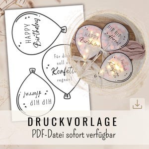 May include: A sheet of paper with black line drawings of balloon shapes, each with text such as "Happy Birthday!" and "Hip Hip Hurra!". Beside it, three illuminated balloon decorations with confetti and text. The image also includes the text "DRUCKVORLAGE PDF-Datei sofort verfügbar".