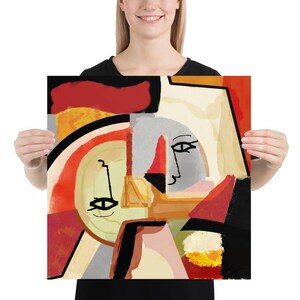 K&ouml;nnte beinhalten: Abstrakter Kunstdruck mit einer kubistisch anmutenden Gesichts-Komposition. Das Kunstwerk verwendet eine Palette aus Rot, Orange, Schwarz und Grau, mit einem cremefarbenen Hintergrund. Das Design umfasst geometrische Formen und Linien.