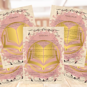 May include: Five pink and gold cards with a book design on the front. Each card has a different spell name, level, and description. The spell names are Stoneskin, Morpriva, Ice Storm, Magic Circle, and Fire Image.