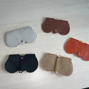Étui à lunettes de soleil portable moderne en cuir, sac à lunettes de soleil clipsable tendance, sac à lunettes de protection pour le transport, housse minimaliste pour lunettes