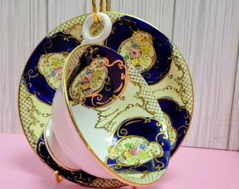 Regent Bone China theekop en schotel • Kobaltblauwe bloemen, goud verguldsel