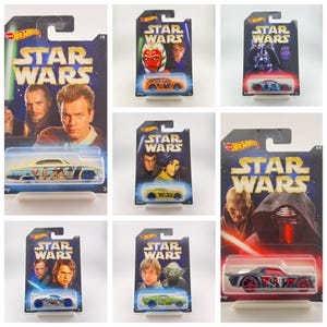 May include: A set of ten Star Wars Hot Wheels die-cast cars in their original packaging. Each car features a different character from the Star Wars franchise, including Darth Vader, Yoda, and Luke Skywalker. The cars are all 1/8 scale and are in mint condition.
