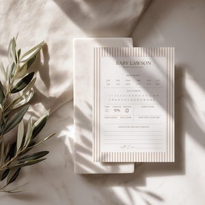 May include: A rectangular baby shower prediction card featuring a beige and white vertical striped border. The text includes BABY LAWSON, BIRTH MONTH, DAY OF BIRTH, TIME, LENGTH, WEIGHT, BABY'S NAME, HAIR COLOR, EYE COLOR, and ADVICE FOR THE NEW PARENTS.