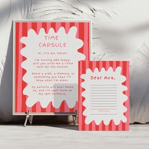 May include: A pink and red time capsule set. The larger piece reads "TIME CAPSULE" and includes a message from Ethan. The smaller card says "Dear Ava" and has lines for writing. Both have a wavy white border.