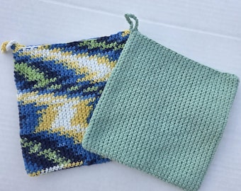 Dubbel dikke gehaakte pannenlappen, effen en ombré katoenen onderzetters, per stuk en in sets.