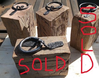 Hand hewn beam doorstop, from 1880 barn, forged ring, hitching ring