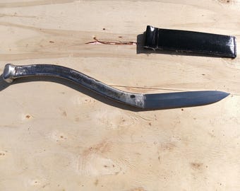 Large knife from curved wrench, boar sword, hog splitter