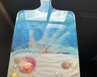 Tabla de embutidos con temática playera