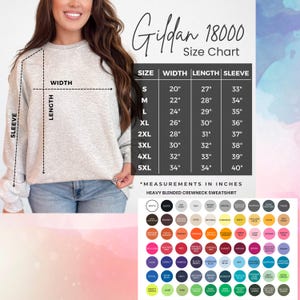 May include: A light gray Gildan 18000 heavy blended crewneck sweatshirt size chart. The chart shows measurements in inches for width, length, and sleeve length, ranging from size S to 5XL. A color palette is displayed at the bottom.