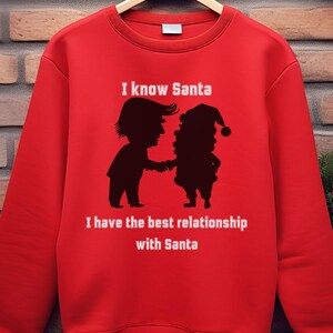 Christmas Trump Santa Sweatshirt, Funny Holiday Gift for Trump Supporters, Ugly Sweater Party Shirt, Xmas Joke Top, Political Humor Apparel