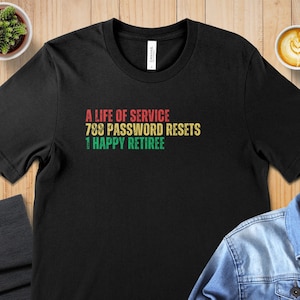 May include: Black t-shirt with a vintage-style graphic that reads "A life of service 788 password resets 1 happy retiree".