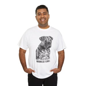 May include: White t-shirt with a black and white image of a Shar-Pei dog and the text "Wrinkles & Chill".