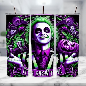 May include: A purple and green tumbler with a graphic of a character from the movie "Beetlejuice" with the text "Never Trust the Living It's Show Time".