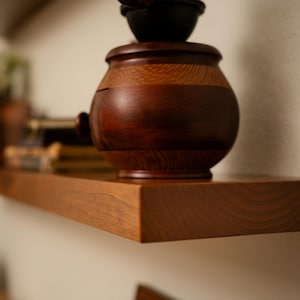 Knotty Alder Floating Shelf: Heavy Duty Hidden Bracket - 45 lbs per Stud