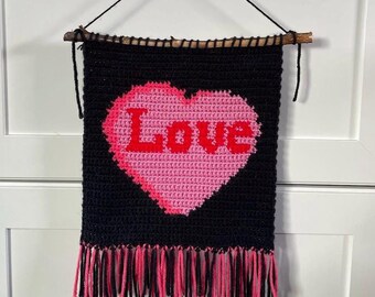 Patrón de tapiz de crochet con forma de corazón de caramelo