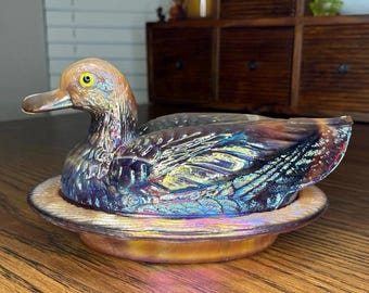 Pato de cristal escoria de carnaval grande de Westmoreland en su nido