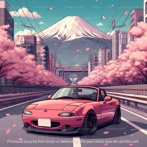 Puede incluir: Un coche deportivo rosa descapotable conduciendo por una calle bordeada de cerezos en flor. El coche conduce hacia el monte Fuji en el fondo. La escena está ambientada en una ciudad japonesa.