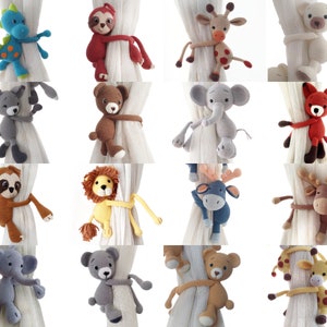 May include: A collection of crocheted animal curtain tiebacks in various colours and designs, including a sloth, giraffe, elephant, fox, lion, reindeer, and more. These adorable tiebacks are perfect for adding a touch of whimsy to any nursery or child's room.
