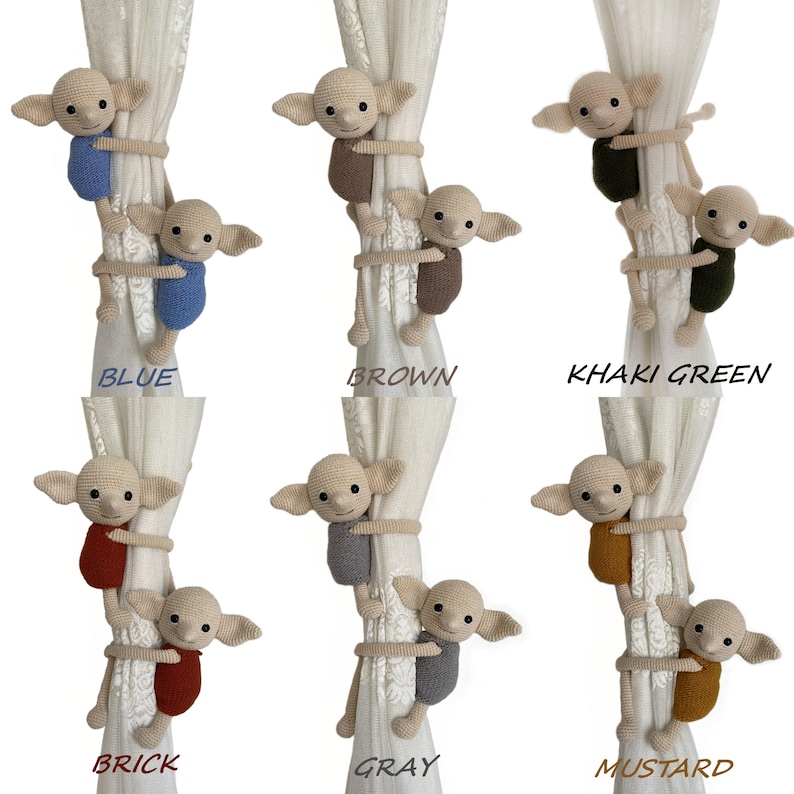 May include: Six crocheted elf dolls in different colours, each holding onto a white curtain. The colours are blue, brown, khaki green, brick, grey, and mustard.