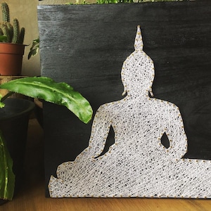 May include: A rustic wooden sign with the text "Welcome to our home" in white lettering. The sign features a distressed finish and a simple, inviting design, perfect for entryway decor.