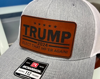 Trump Elect The MF’er Again Leather hat patch on SnapBack hat.