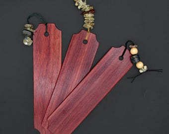 Handgemaakte bladwijzer van bloedhout met kralenstaart van zonnesteen, augiet en mosagaat