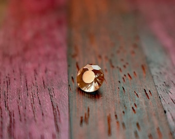 Oregon zonnesteen edelsteen: 0,85 kt perzik rond geslepen, ethisch gedolven in de VS