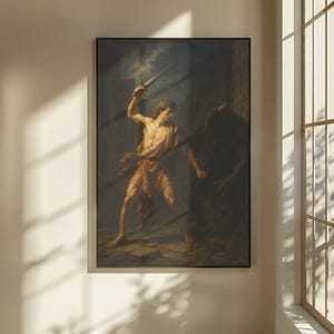 May include: A framed classical painting shows a muscular figure in an orange robe raising a sword against a dark figure. The artwork is set in a dimly lit, stone-walled environment, with dramatic lighting highlighting the central action. The painting is framed in black.