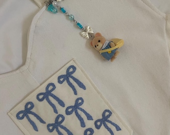 Handmade tote bag with blue ribbon embroidery