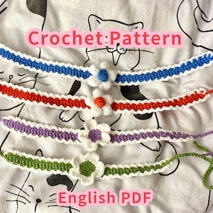 May include: Four crocheted flower headbands in different colors: blue, red, purple, and green. Each headband has a white crocheted flower with a colored center. The text "Crochet Pattern" and "English PDF" is visible in the image.