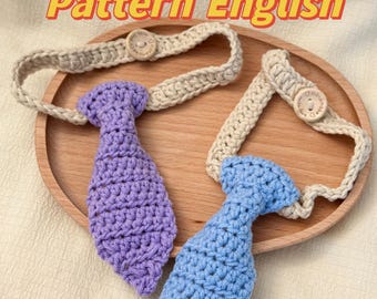 May include: Two crocheted ties, one purple and one light blue, with a beige crocheted headband with a wooden button on each. The text "Pattern English" is written in yellow on a white background.