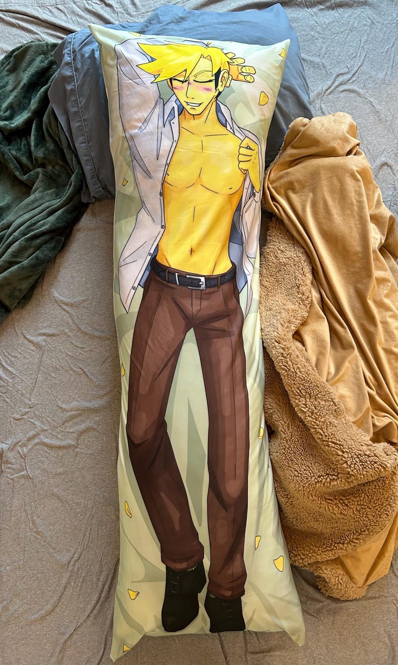 May include: A rectangular body pillowcase featuring a printed illustration of a yellow-skinned character with spiky blonde hair, wearing an unbuttoned white shirt, dark brown trousers with a black belt, and black shoes against a light green background.