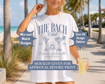 Può includere: Una t-shirt bianca con testo blu che recita THE BACH CLUB, EST. 2026, Madison's Bachelorette e CABO SAN LUCAS. La grafica include illustrazioni di due cocktail e una conchiglia. Il testo sovrapposto include Mix and Match Designs, Over 60 Design Options e MOCKUP GIVEN FOR APPROVAL BEFORE PRINT.