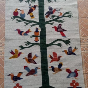 tapete árbol de la vida elaborado en teotitlan del valle Oaxaca,hecho en telar de pedal,con 100%lana de oveja,86cmde ancho x 1m47cm de largo
