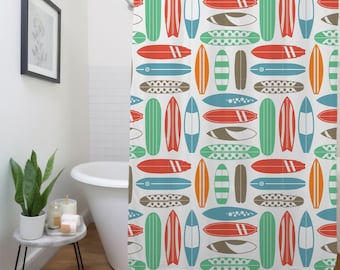 May include: A white shower curtain featuring a repeating pattern of colourful surfboards. The surfboards are in various shades of blue, green, orange, and brown. The background is white.
