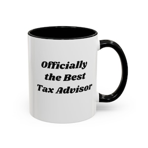 May include: White ceramic mug with a black interior and handle. The mug features the text "Officially the Best Tax Advisor" in black, bold font. The mug is designed for hot beverages.