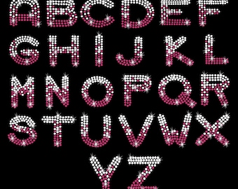 May include: A full alphabet of rhinestone letters in pink and white. Each letter is made of small, round rhinestones. The letters are arranged in three rows. The letters are 9.232 inches wide and 16.694 inches high.