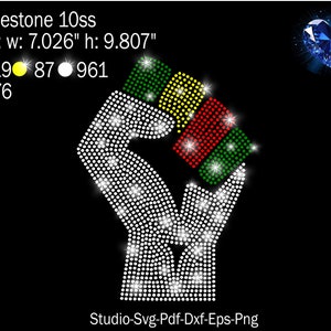 May include: A raised fist with a red, yellow, green, and black color scheme, made of rhinestones. The fist is 7.026 inches wide and 9.807 inches tall. The rhinestones are 10ss size. The colors are represented by numbers: 119, 87, 961, and 176.