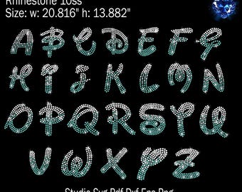 May include: A full alphabet of letters made from rhinestones. The letters are in a whimsical font and are approximately 20.8 inches wide and 13.8 inches tall.