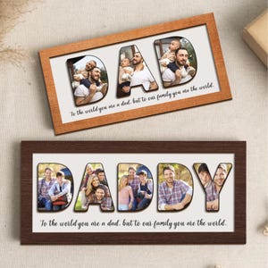 Puede incluir: Dos marcos de fotos con las palabras "DAD" y "DADDY" en letras grandes. Cada letra contiene una foto familiar. El texto "Para el mundo eres un padre, pero para nuestra familia eres el mundo" está debajo.