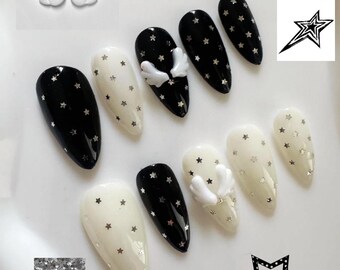 Handgemaakte Angel Wing Star-polkadotpers op de nagels