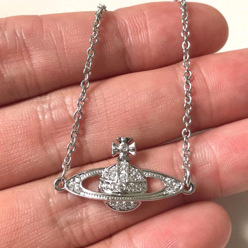 New in Box Vivienne Westwood Bracelet,gold CZ Diamond Saturn Bracelet