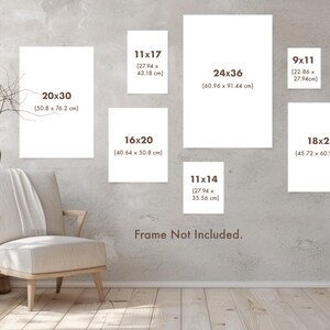 May include: A mockup of different sized prints with dimensions listed in inches and centimeters. The prints are displayed on a light gray wall with a wooden floor. The text "Frame Not Included." is displayed below the prints.