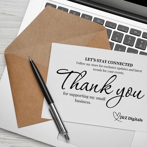 May include: A white thank you card with black text that reads "Let's Stay Connected. Follow my store for exclusive updates and latest trends for your events. Thank you for supporting my small business. J&Z Digitals". The card is on a laptop with a brown envelope and a pen.